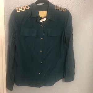 Green shirt with gold hardware